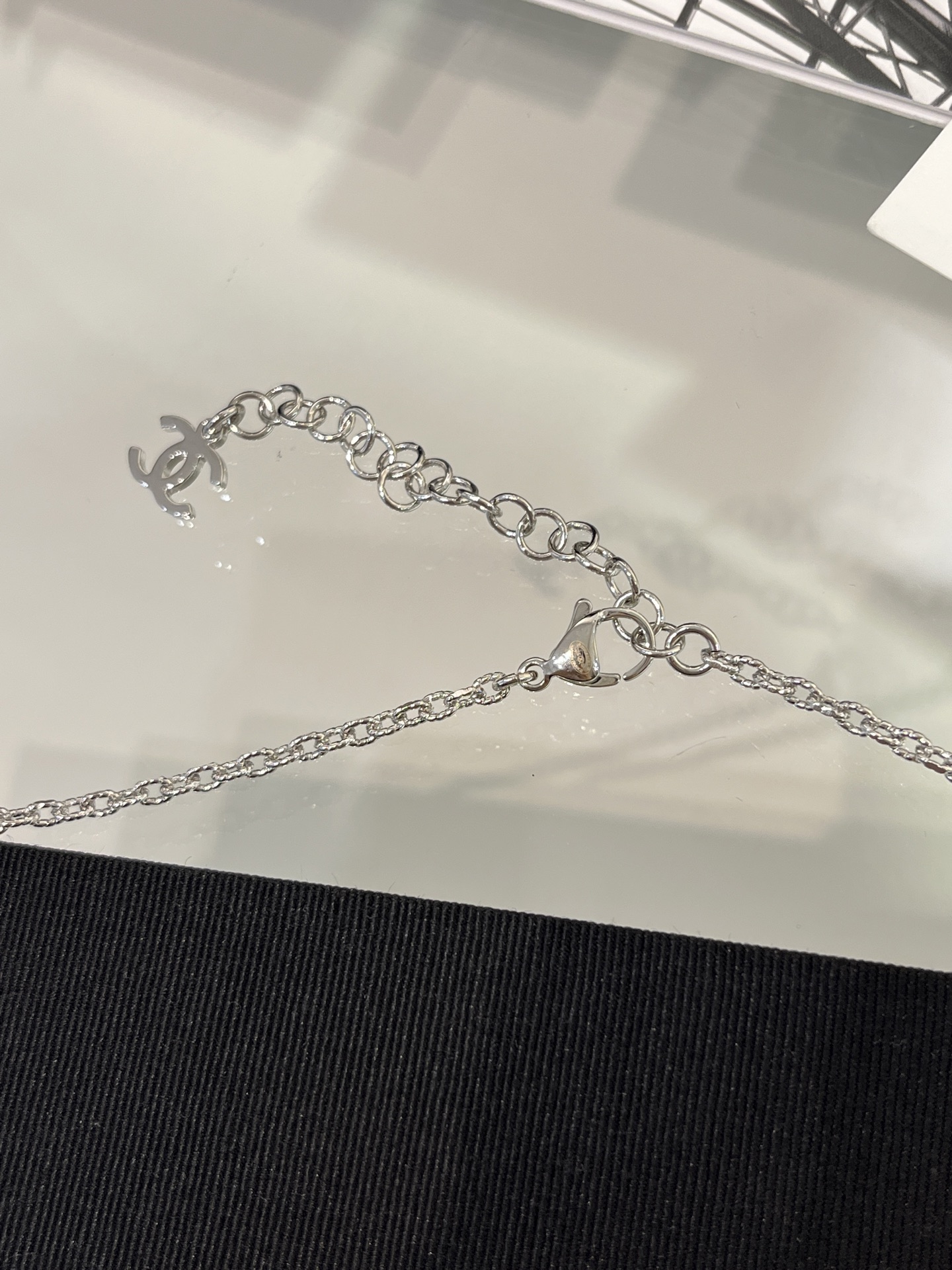 CHANEL 25S New Silver Bird-Inspired Double C Pearl Necklace - LuxuryEva