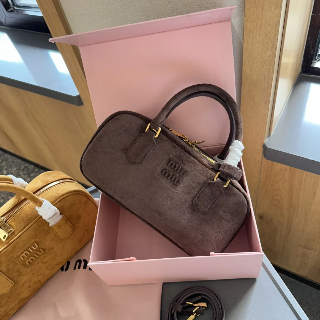 MiuMiu Arcadie padded suede top-handle bag - LuxuryEva