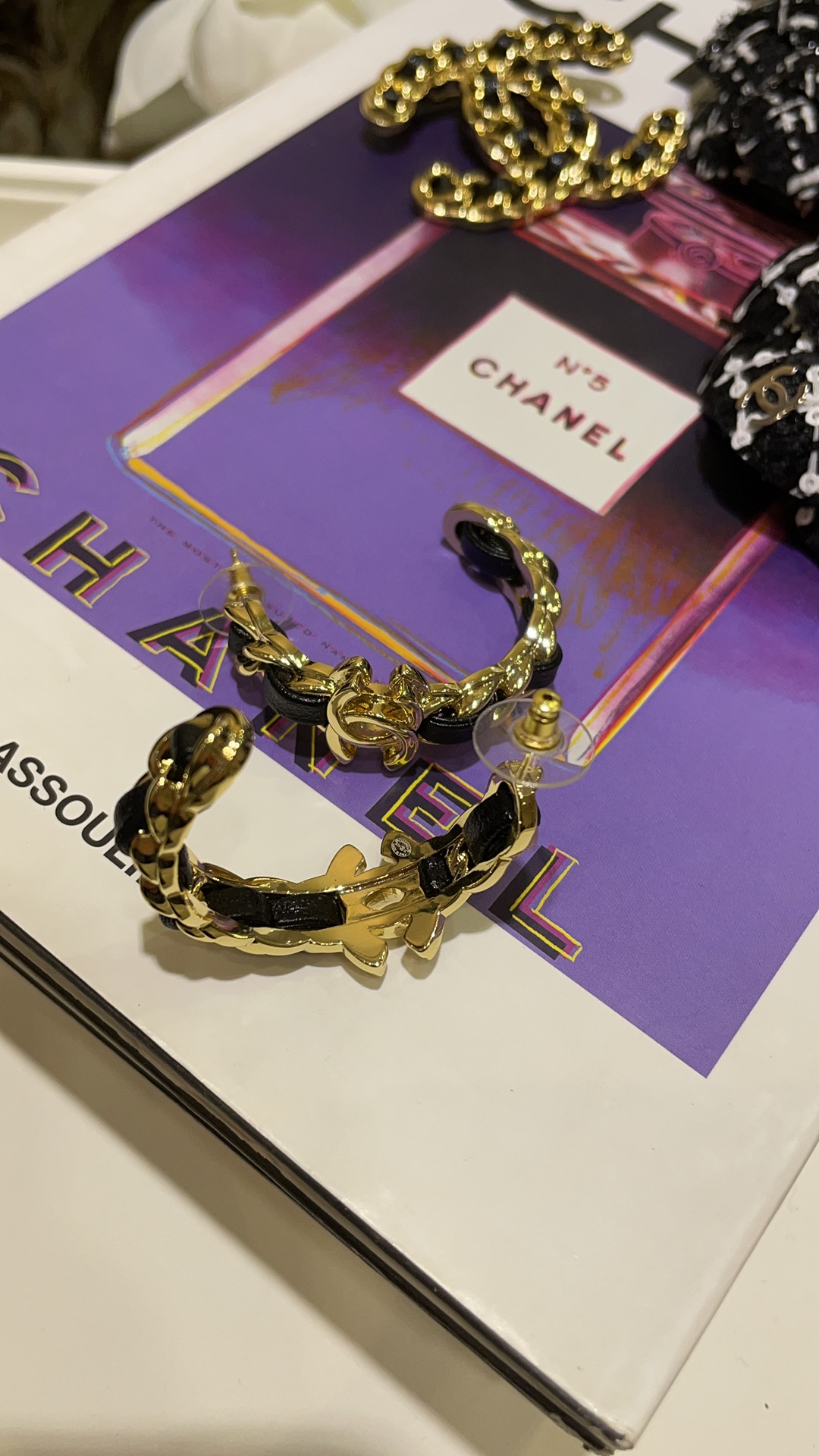 CHANEL 24K New Gold Double C Hoop Earrings with Leather-Woven Chain - LuxuryEva