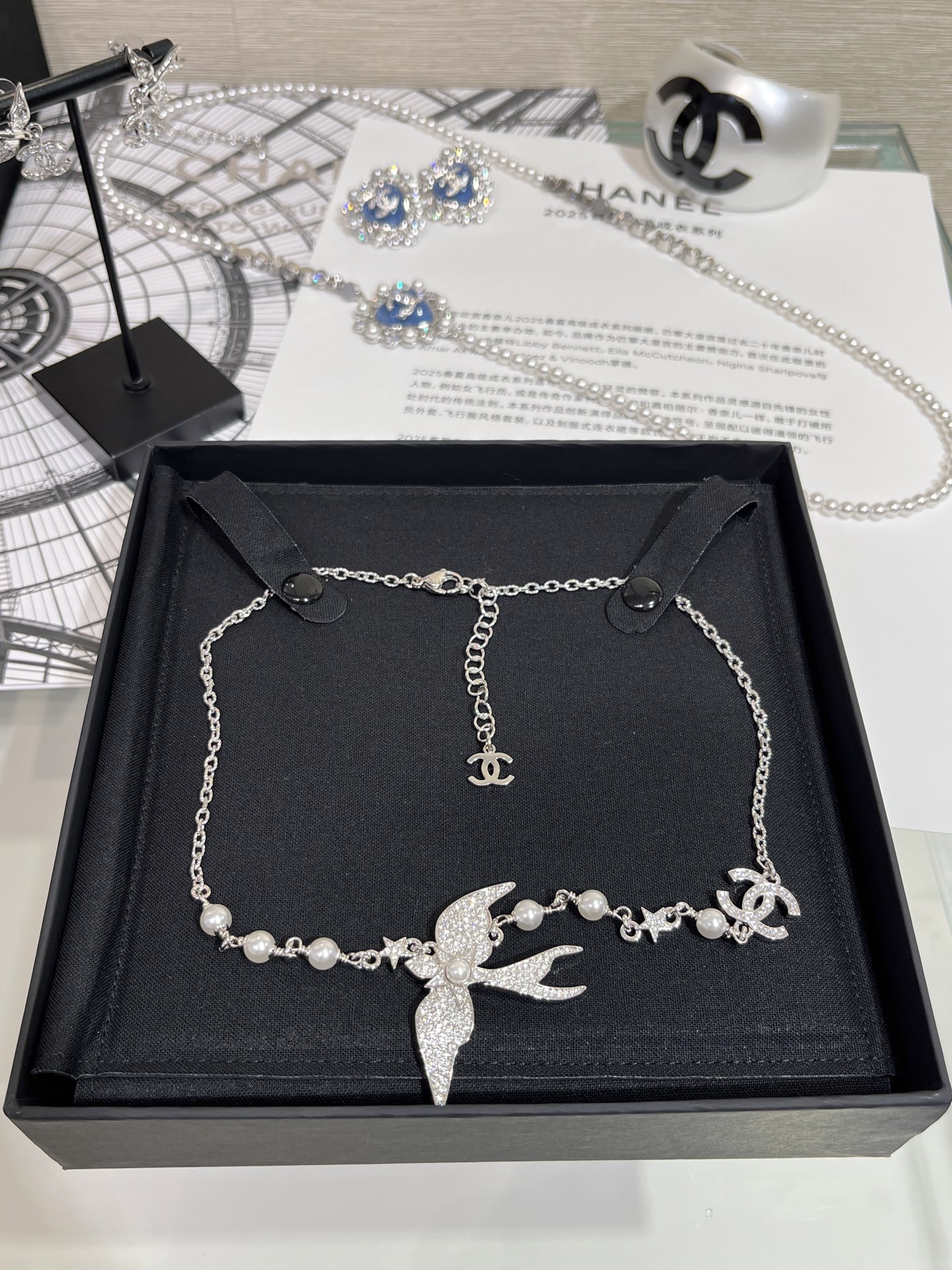 CHANEL 25S New Silver Bird-Inspired Double C Pearl Necklace - LuxuryEva