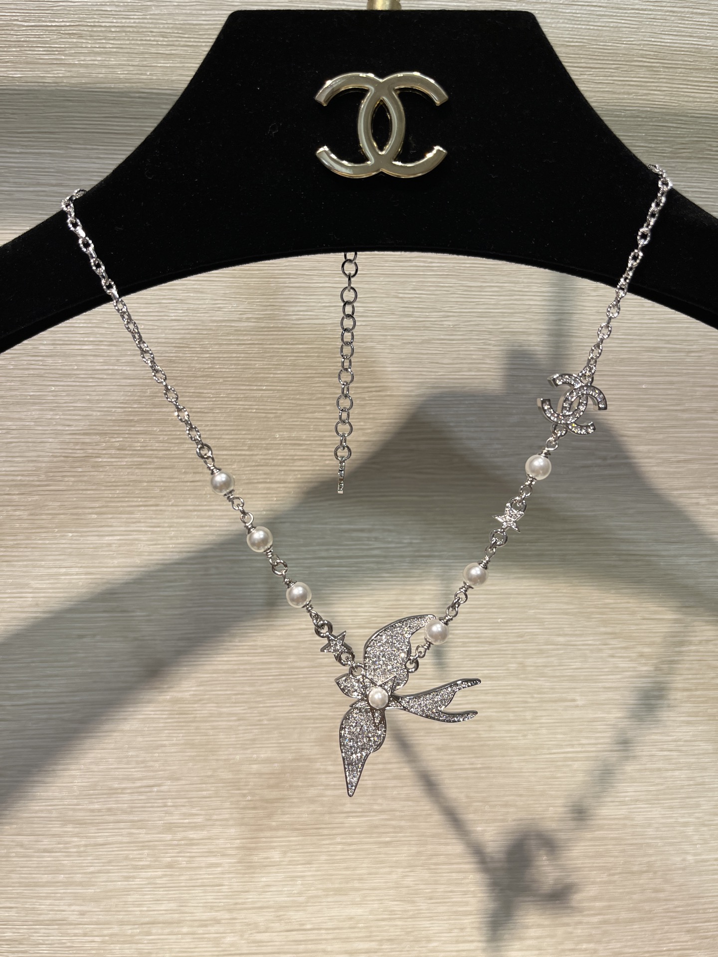 CHANEL 25S New Silver Bird-Inspired Double C Pearl Necklace - LuxuryEva