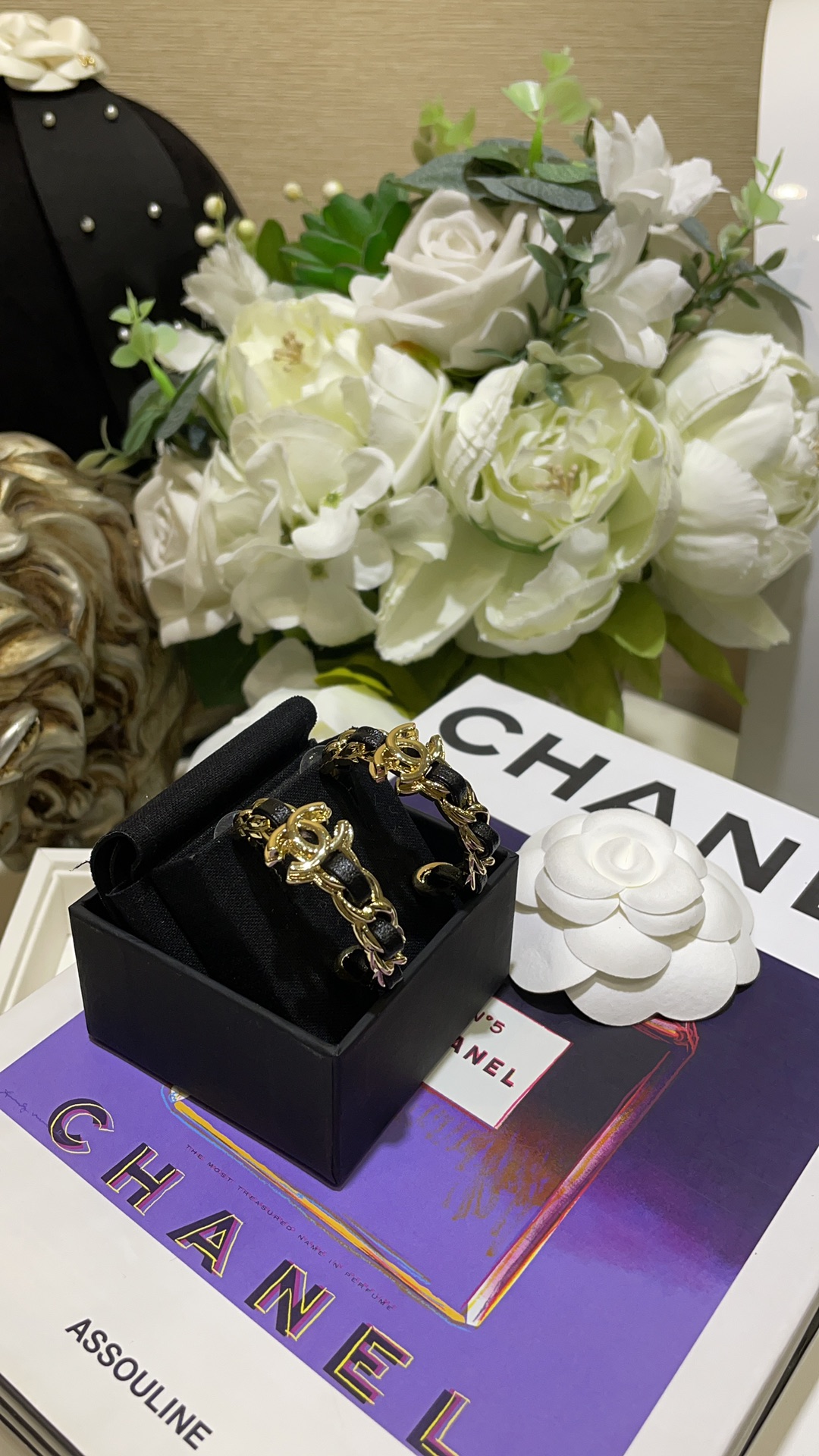 CHANEL 24K New Gold Double C Hoop Earrings with Leather-Woven Chain - LuxuryEva